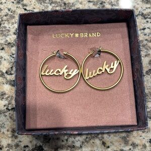 Lucky Brand Gold Hoop Earrings Lucky in Cursive Script NWT